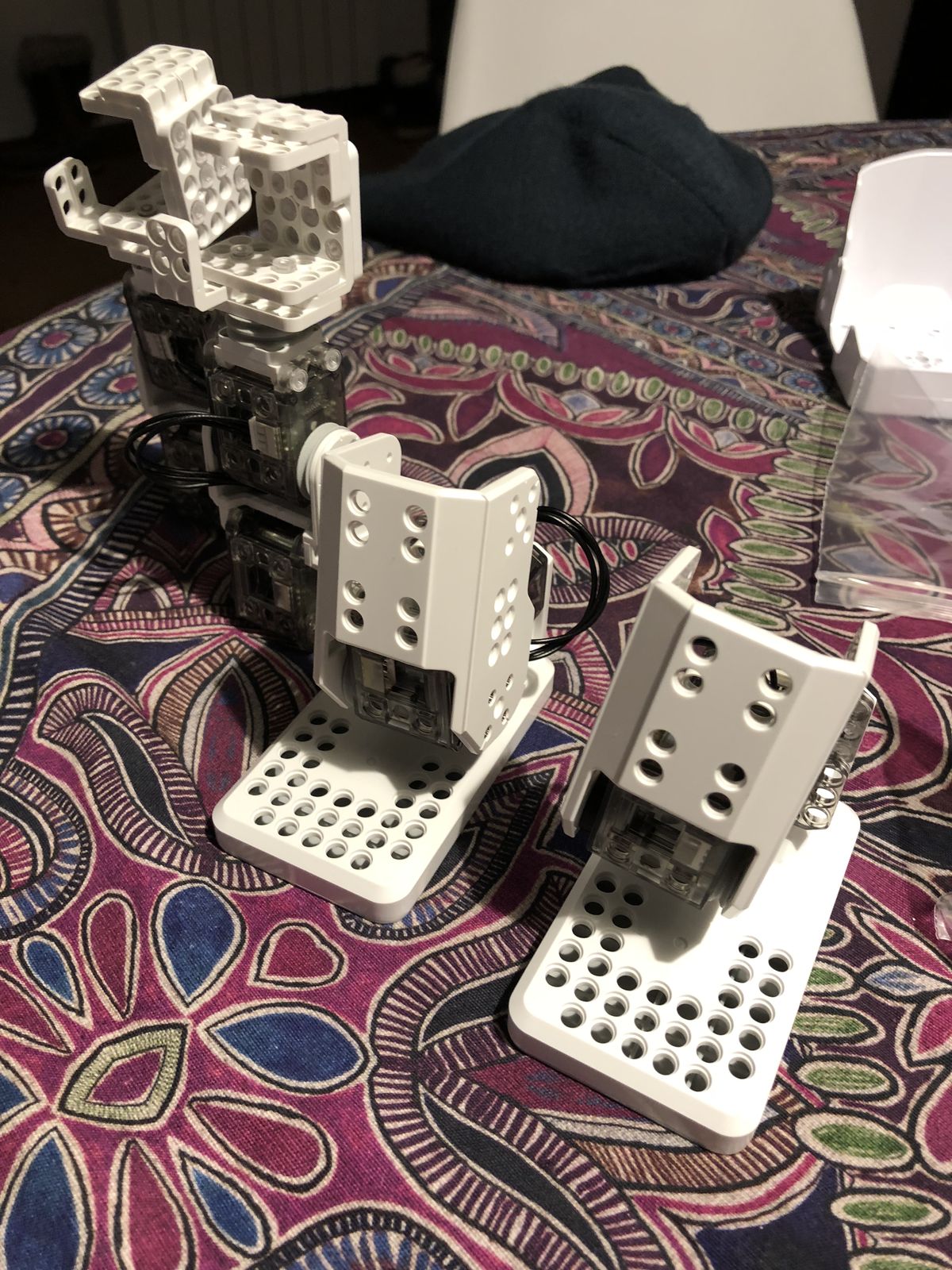Both legs built next to the arms