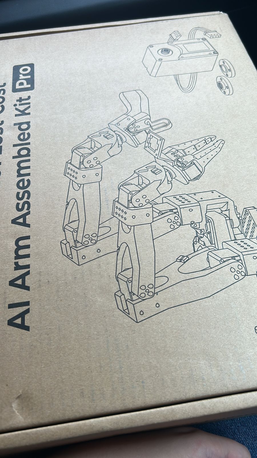 The SO-101 Pro kit box, with a drawing of both arms